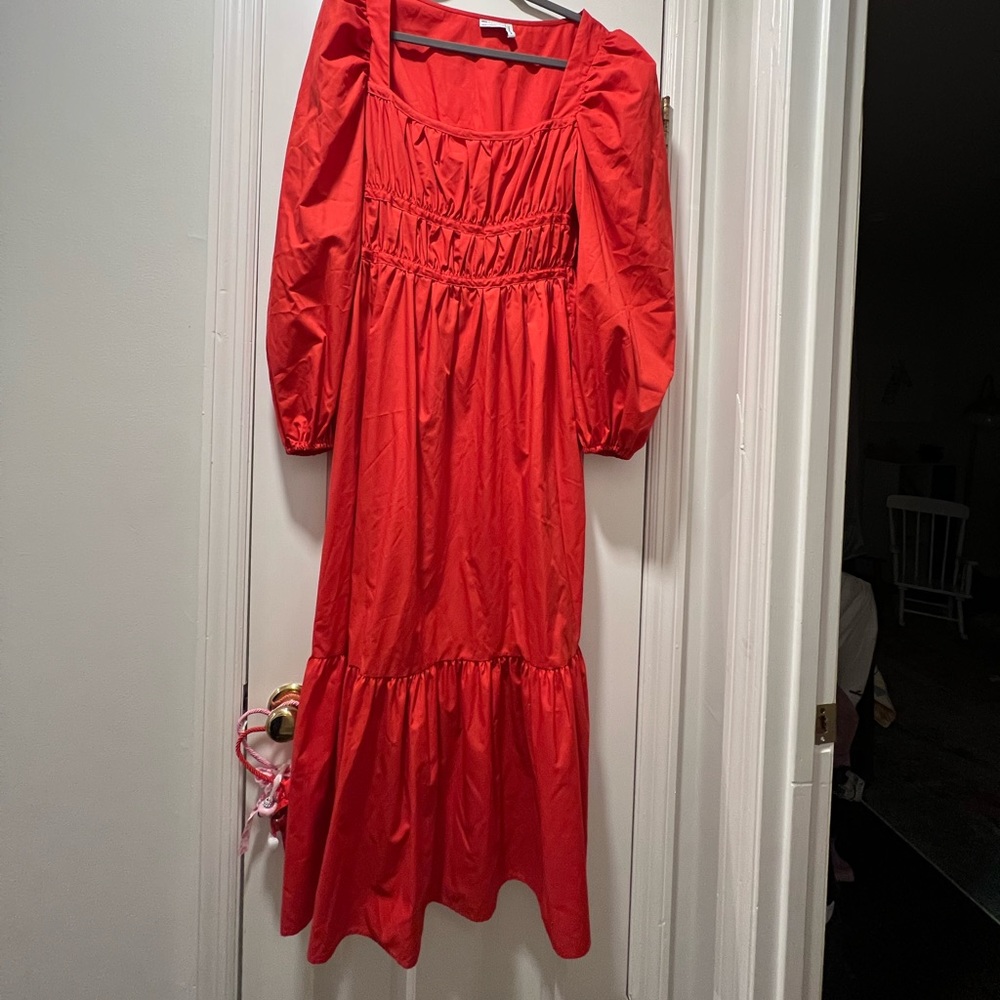 Gorgeous flowy tomato/red maxi dress with sleeves.  Size 8 sweetheart neckline
